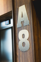 Projekt Systemu Informacji wizualnej w hotelu SOFRA w Mielnie